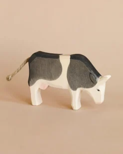 Cow - Black & White - Eating>Ostheimer Discount